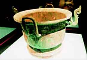 A vessel from the same time period and region (Shaanxi Province, Western Zhou Dynasty) for preparing and storing liquids, like those made from herbs.